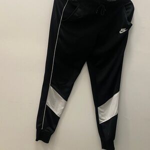 Nike Women’s Black Joggers with White Stripes